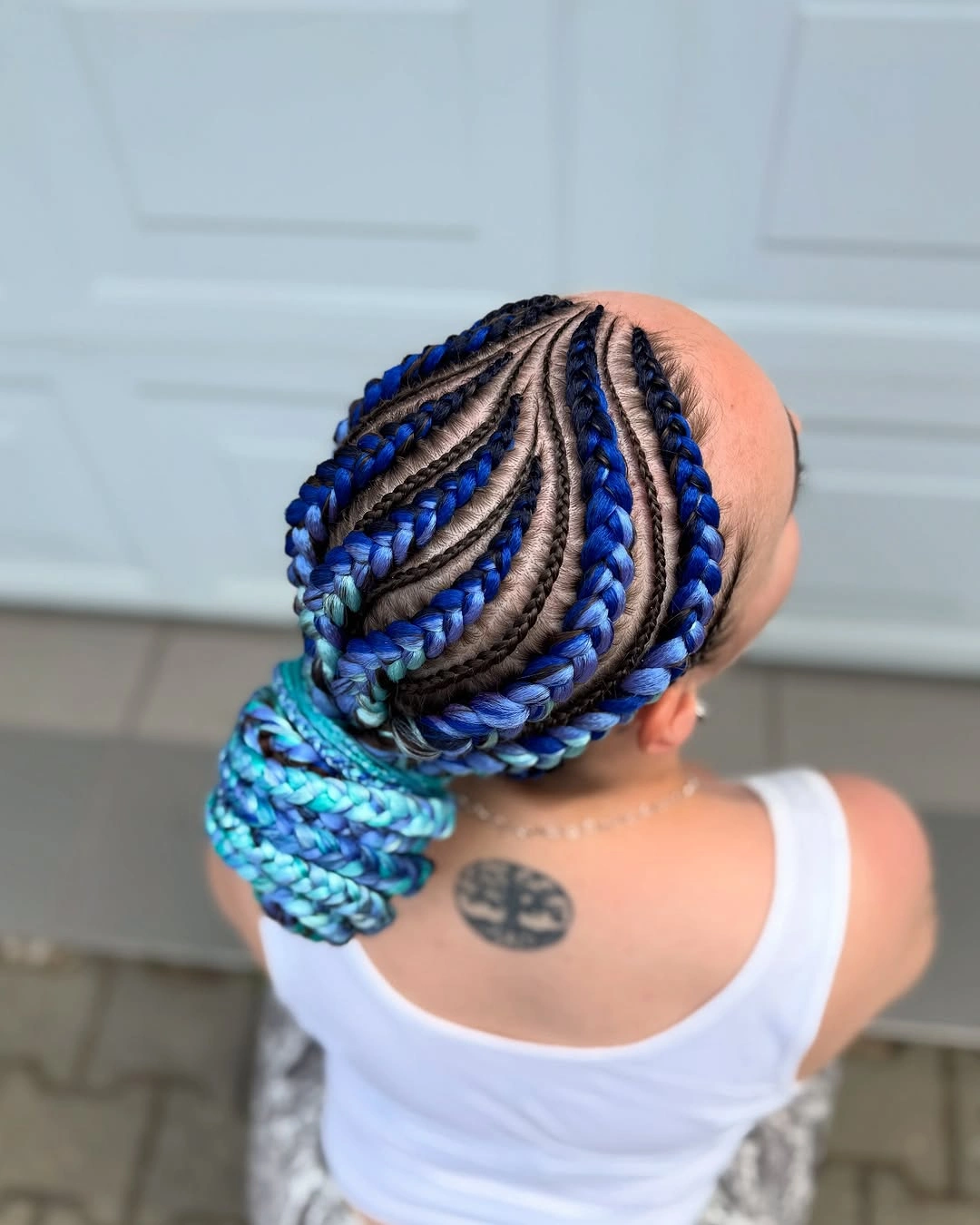 lemonade braid hairstyle Blue Jumbo Lemonade Braids Into A Low Bun