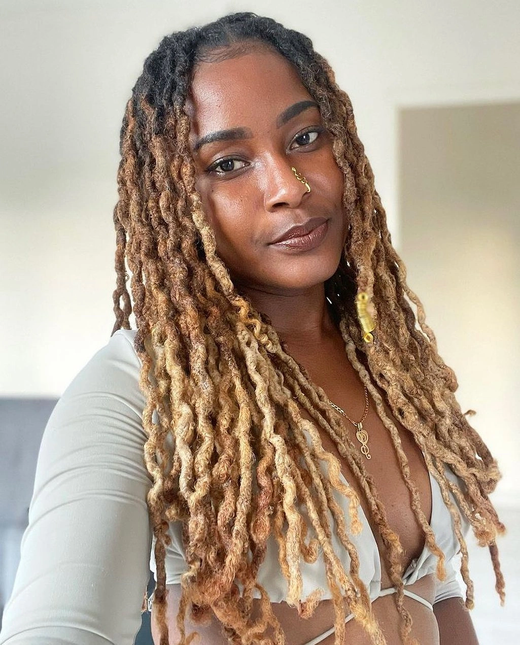 locs hairstyles for black women Long Blonde Locs With Gold Accents