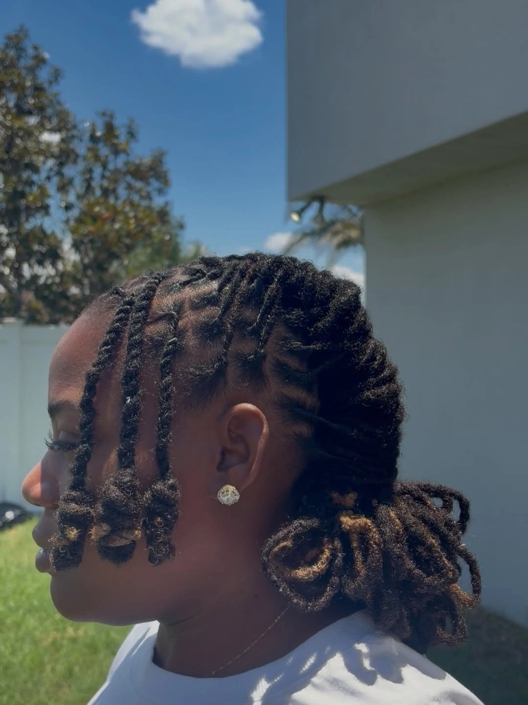locs hairstyles for black women Short Locs With Side Braids And Curled Ends