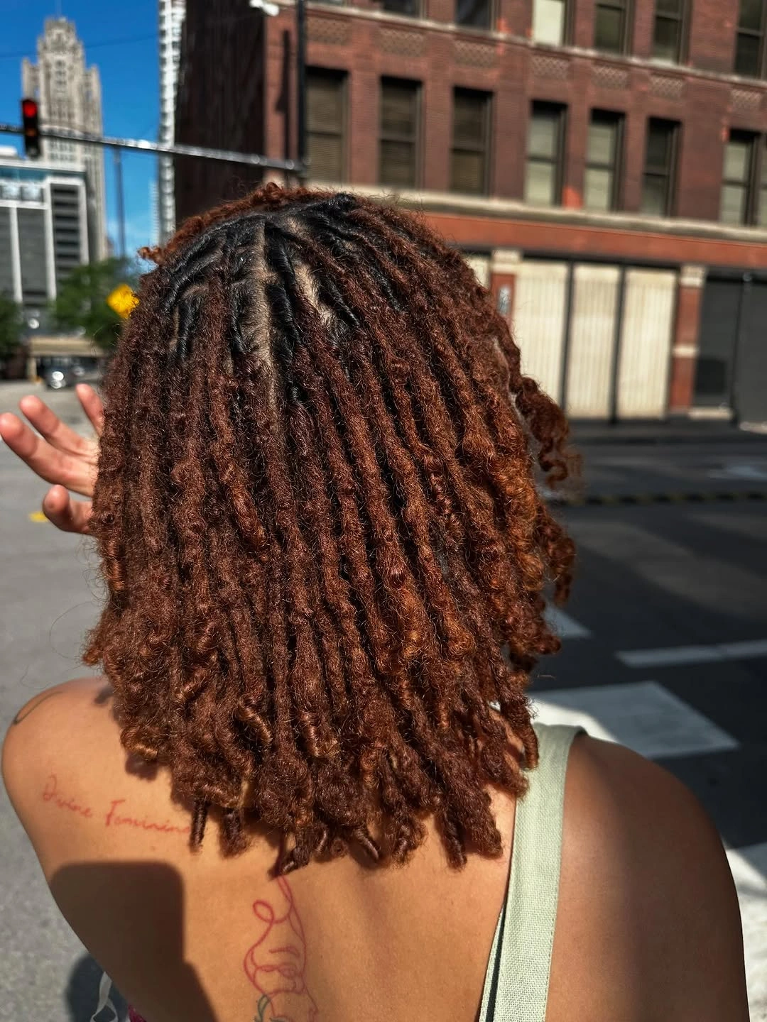 locs hairstyles for black women Copper Shoulder Locs With City-Day Ease
