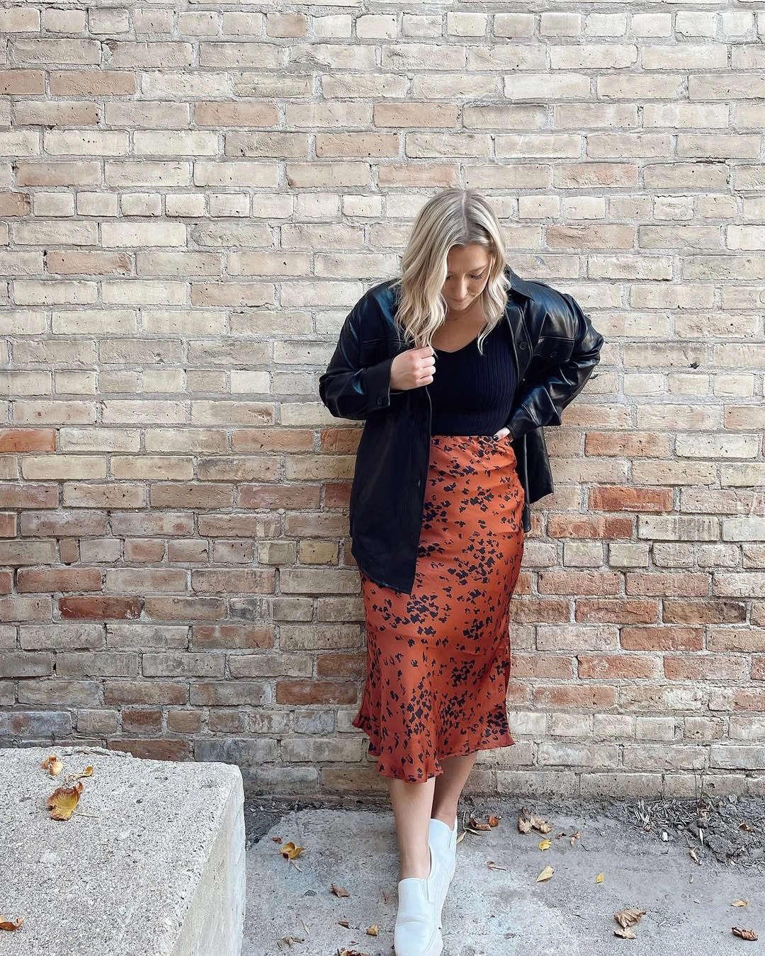 midi skirt fall outfit 2026 + Rust Patterned Satin Midi With Black Leather Layers