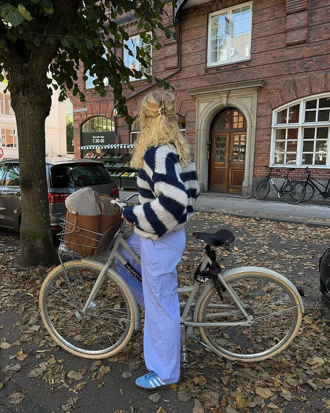 september fashion trends 2026 Striped Sweater With Pale Blue Trousers