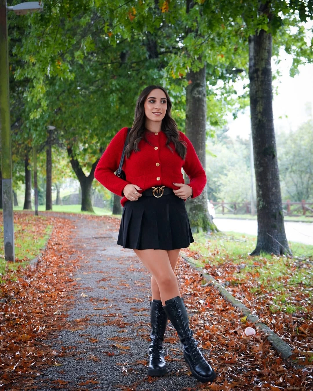 september fashion trends 2026 Red Cardigan With Pleated Black Mini