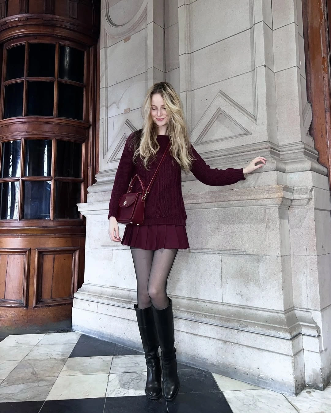 september fashion trends 2026 Burgundy Sweater Dress With Tall Black Boots