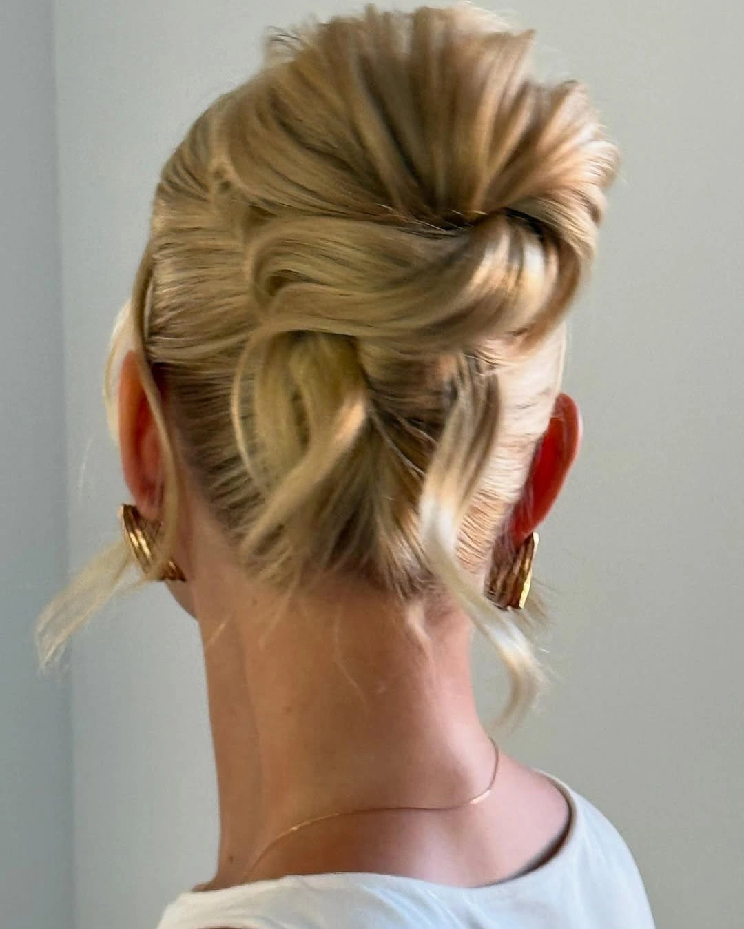 september hairstyles ideas 2026 Twisted Blonde Updo With Smooth Nape