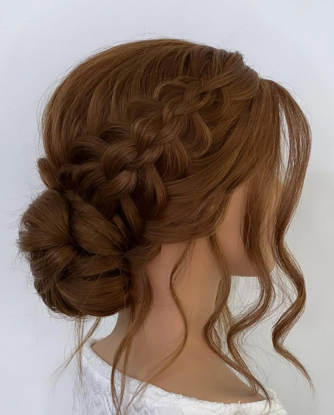 september hairstyles ideas 2026 Braided Side Bun With Loose Front Strands