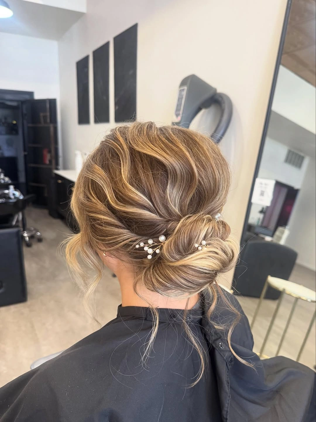 september hairstyles ideas 2026 Low Blonde Bun With Pearl Accent Pins