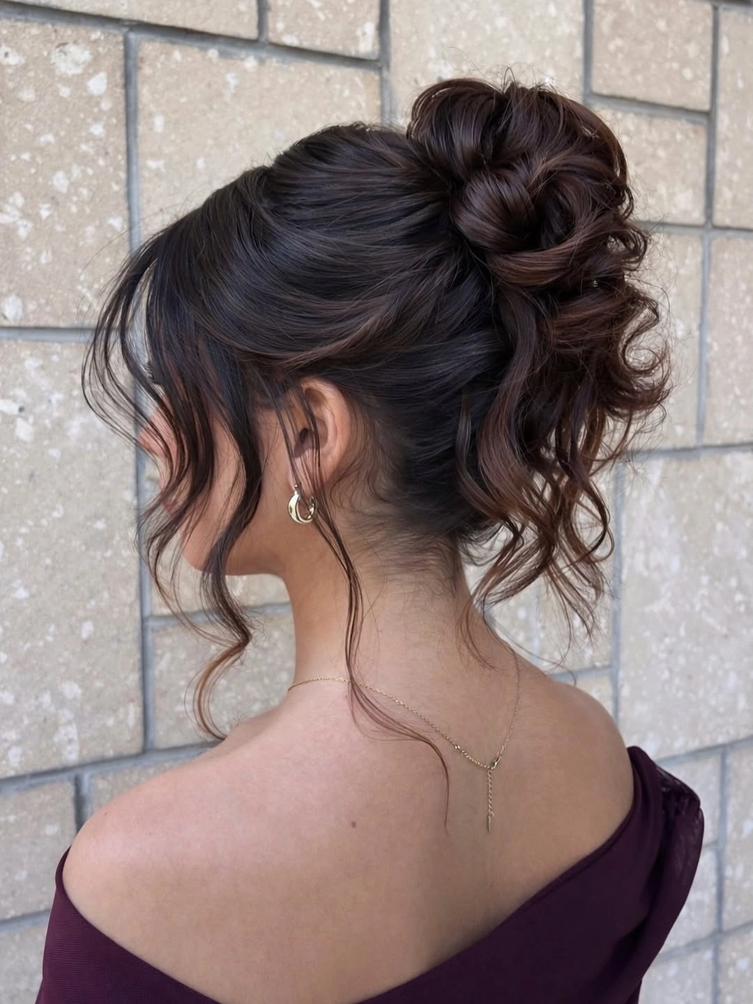 september hairstyles ideas 2026 Textured Brunette Updo With Curled Tendrils