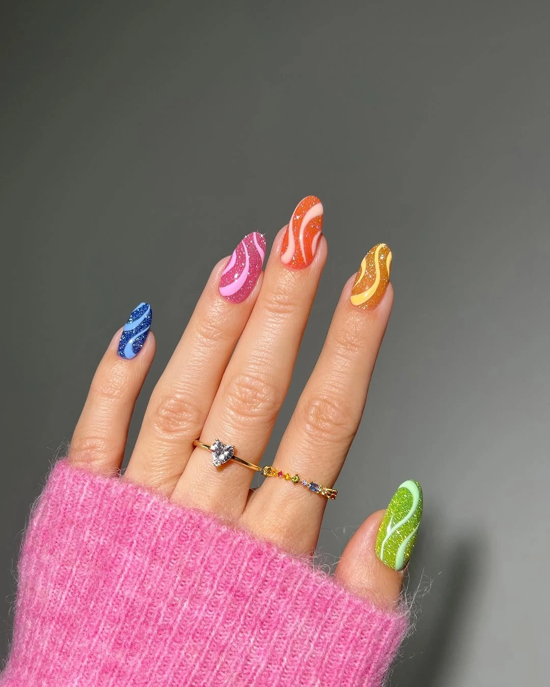 september nail art ideas 2026 Rainbow Swirl Almond Nails with Bright Color Bands