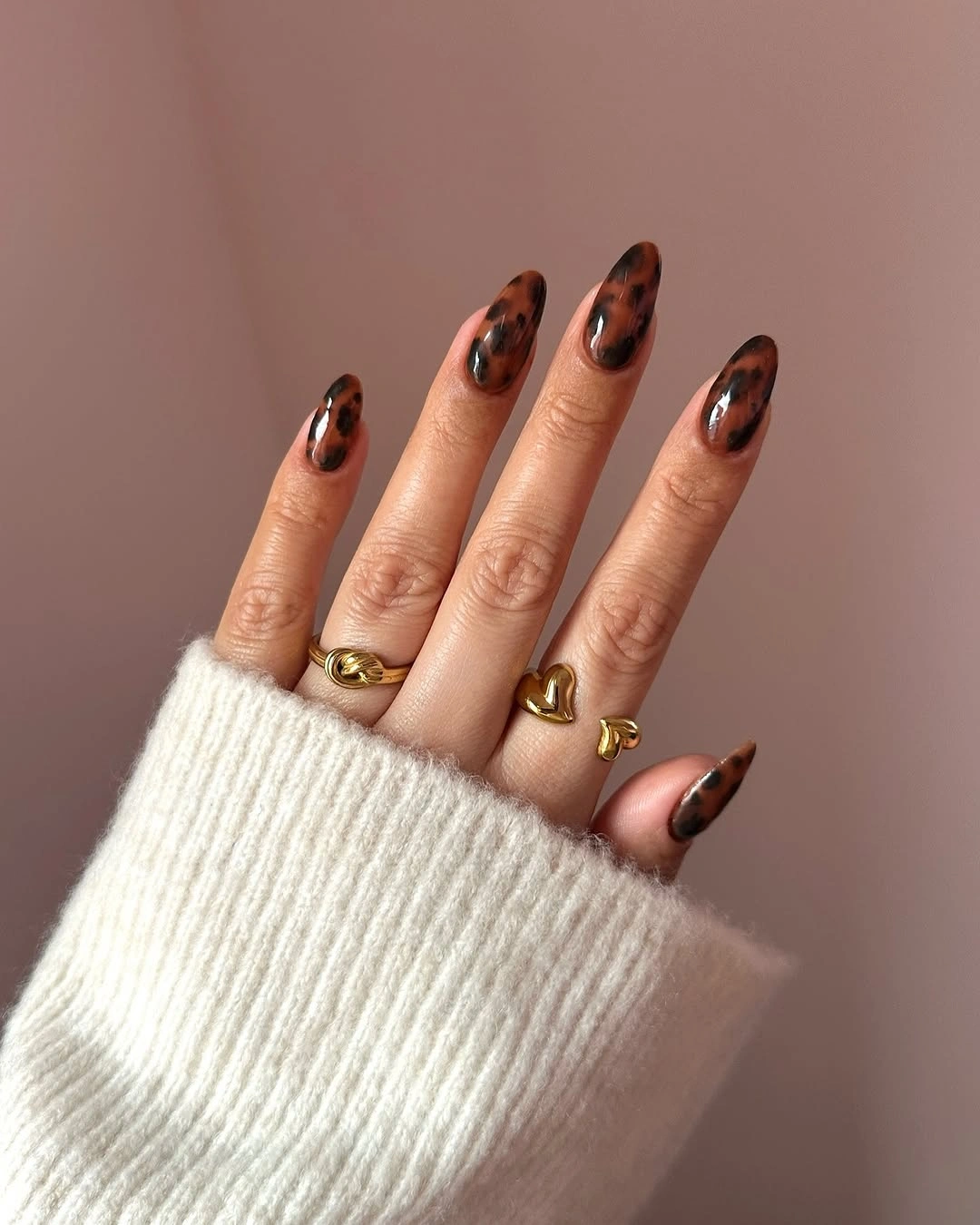 september nail designs 2026 Glossy Brown Tortoise Almond Nails