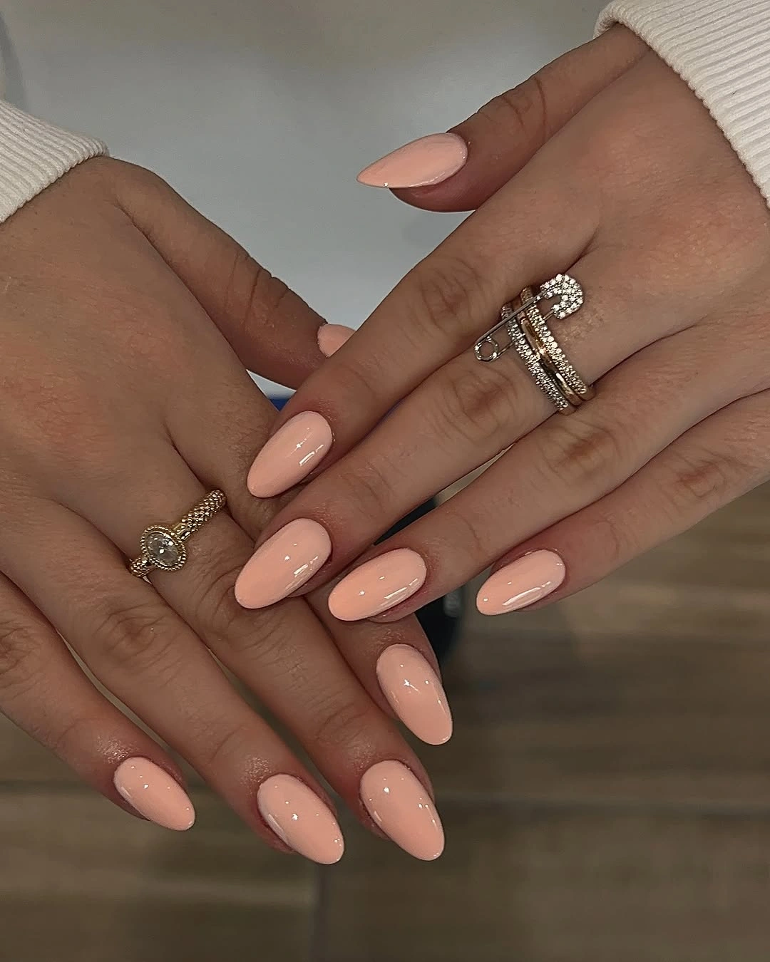 september nails color 2026 Soft Nude Almond Nails with Glossy Finish