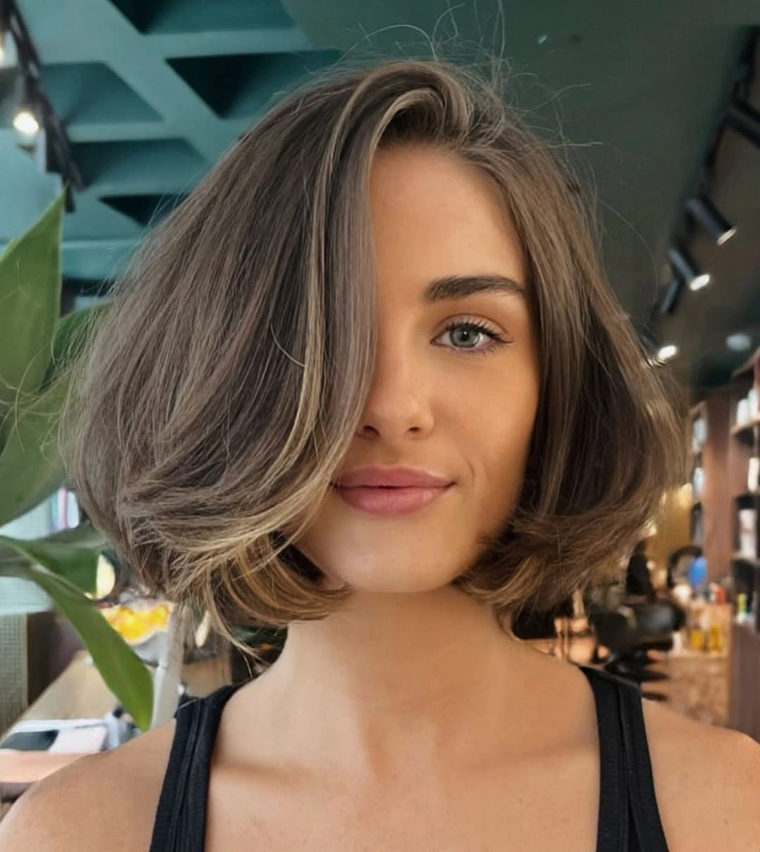 short bobbed hairstyle Highlighted French Bob With Sweeping Volume