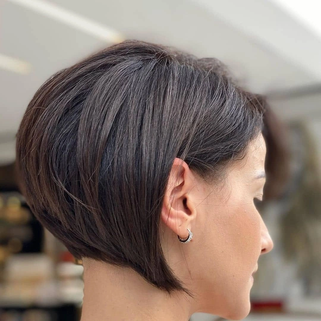 short bobbed hairstyle Short Stacked Brunette Bob With a Pointed Side