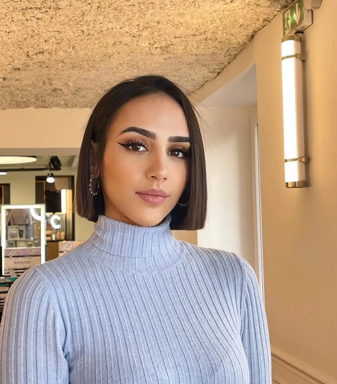 short bobbed hairstyle Understated Brunette Bob With a Square Baseline