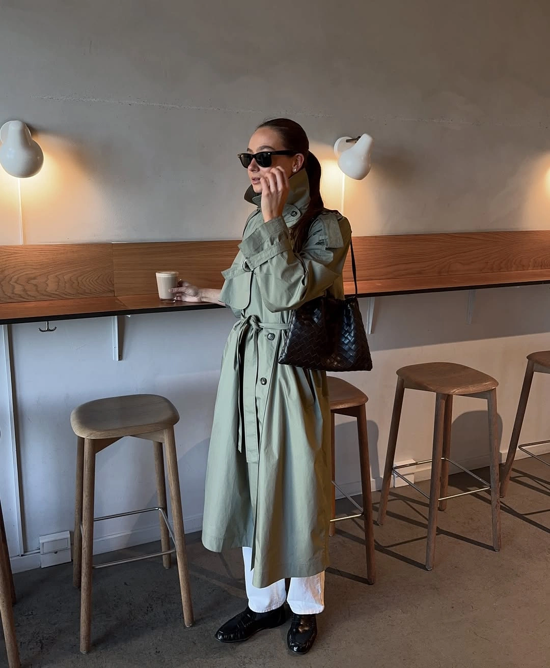 Trench coat fall outfits 2026 + Green Trench With White Pants And Black Loafers
