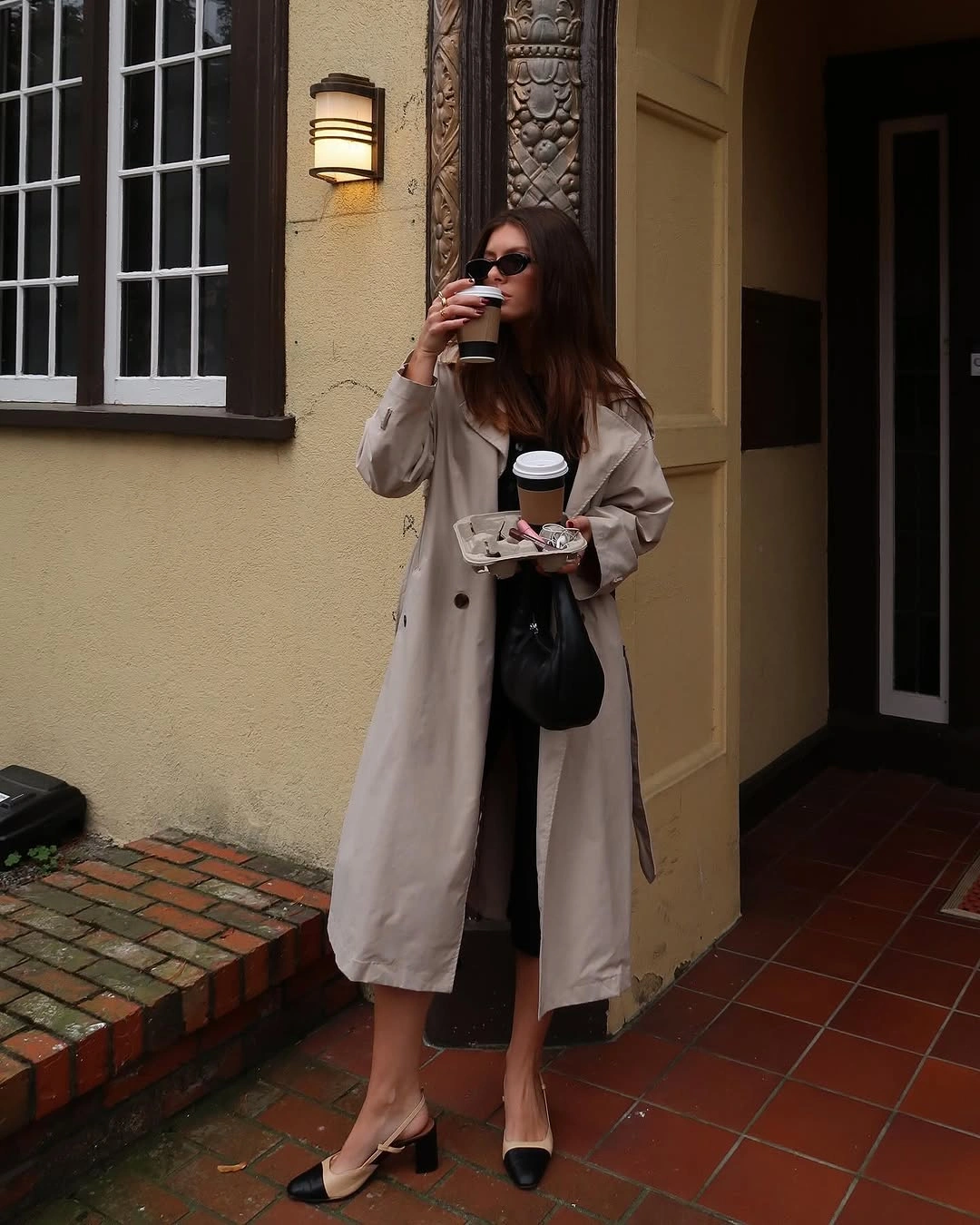 Trench coat fall outfits 2026 + Soft Beige Trench With Black Layers And Cap-Toe Heels