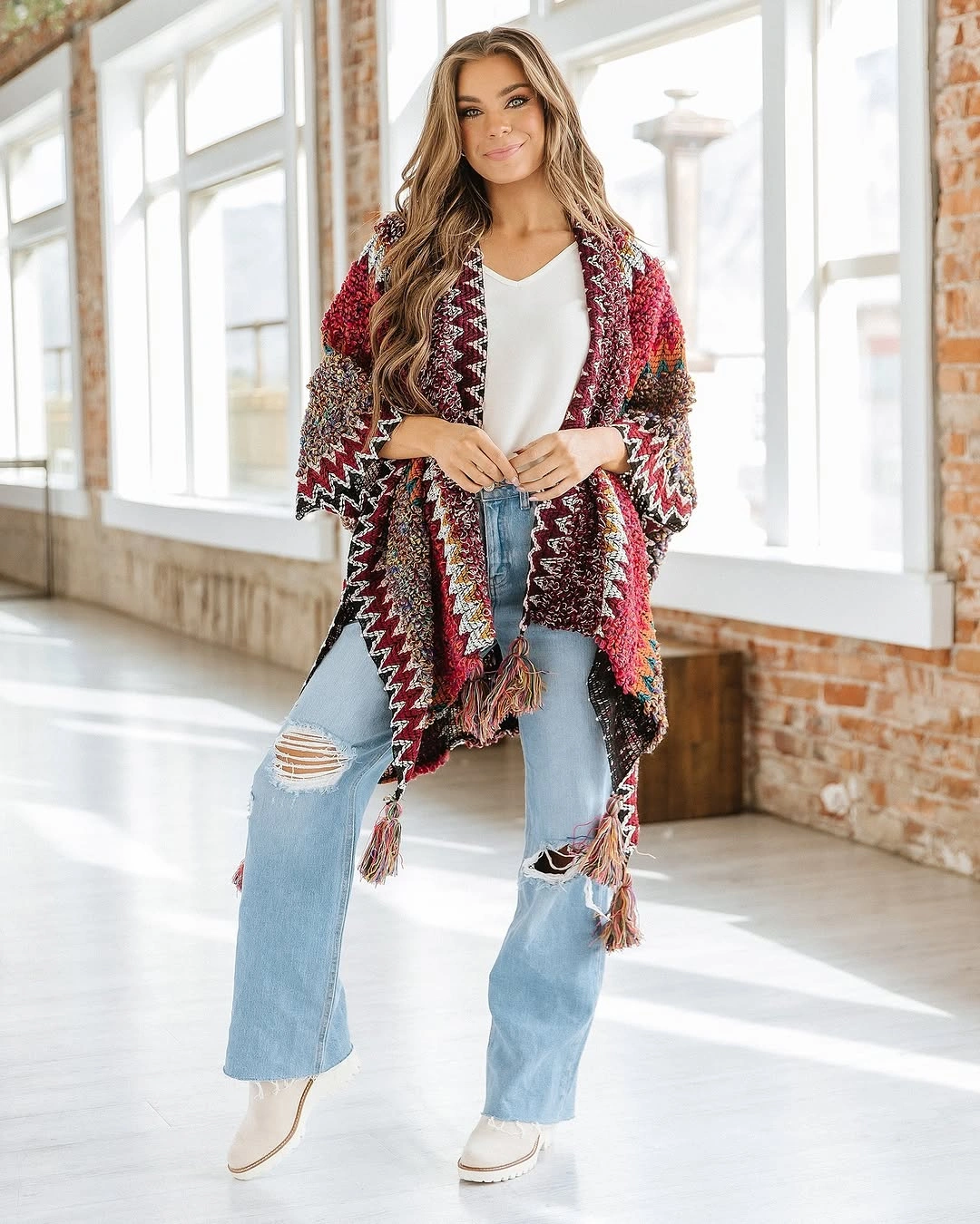 what are the best fall outfits for casual days? Chunky Boho Cardigan With Distressed Light-Wash Jeans