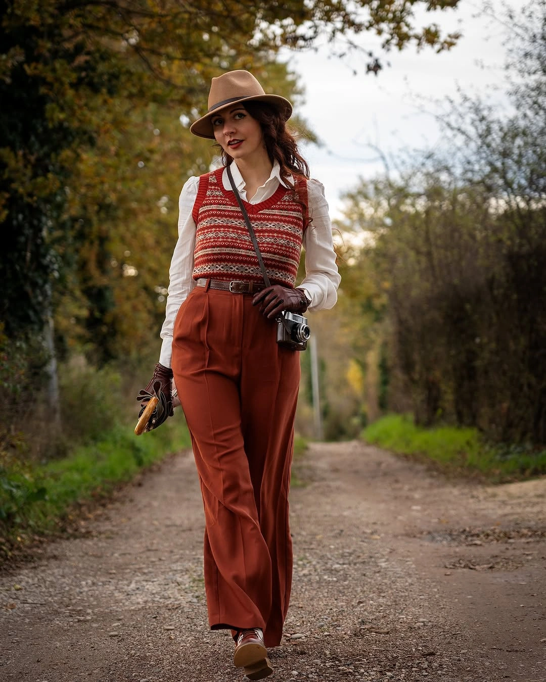 what are the best fall outfits for casual days? Rust Trousers and a Fair Isle Sweater Vest