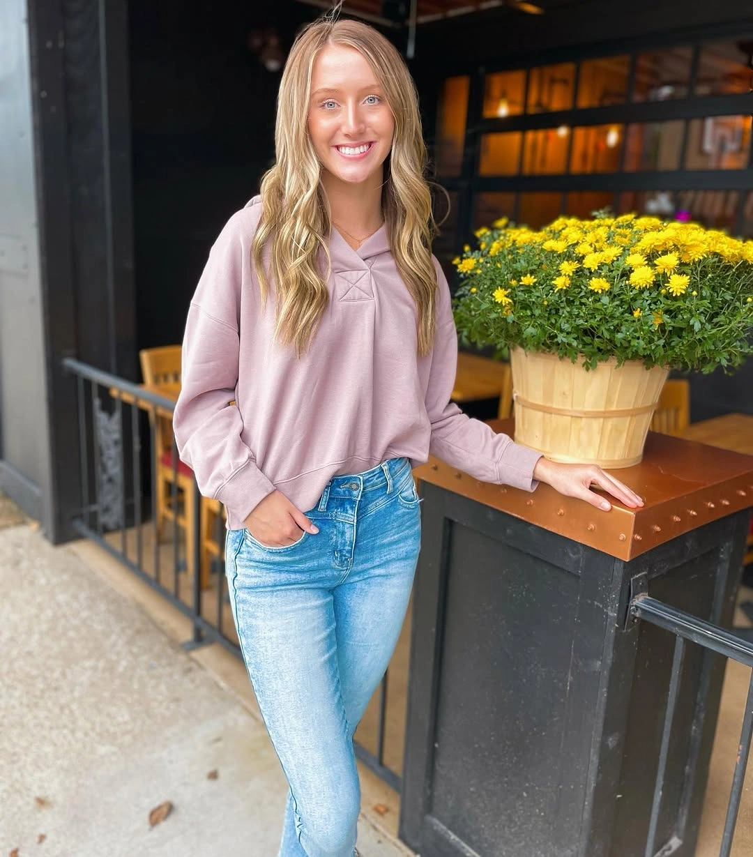 what are the best fall outfits for casual days? Dusty Pink Hoodie With High-Waisted Light Jeans