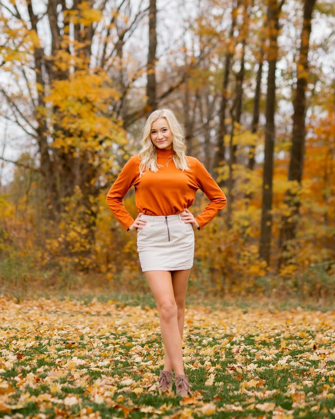 what are the best fall outfits for casual days? Rust Turtleneck With a Cream Mini Skirt