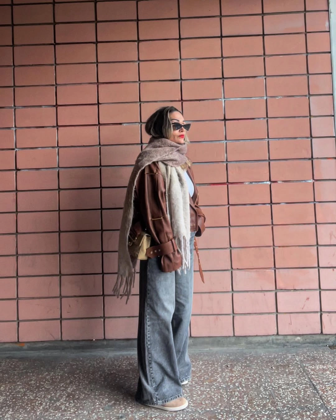 wide leg jeans outfit fall 2026 + Brown Leather and a Blanket Scarf Against Gray Denim