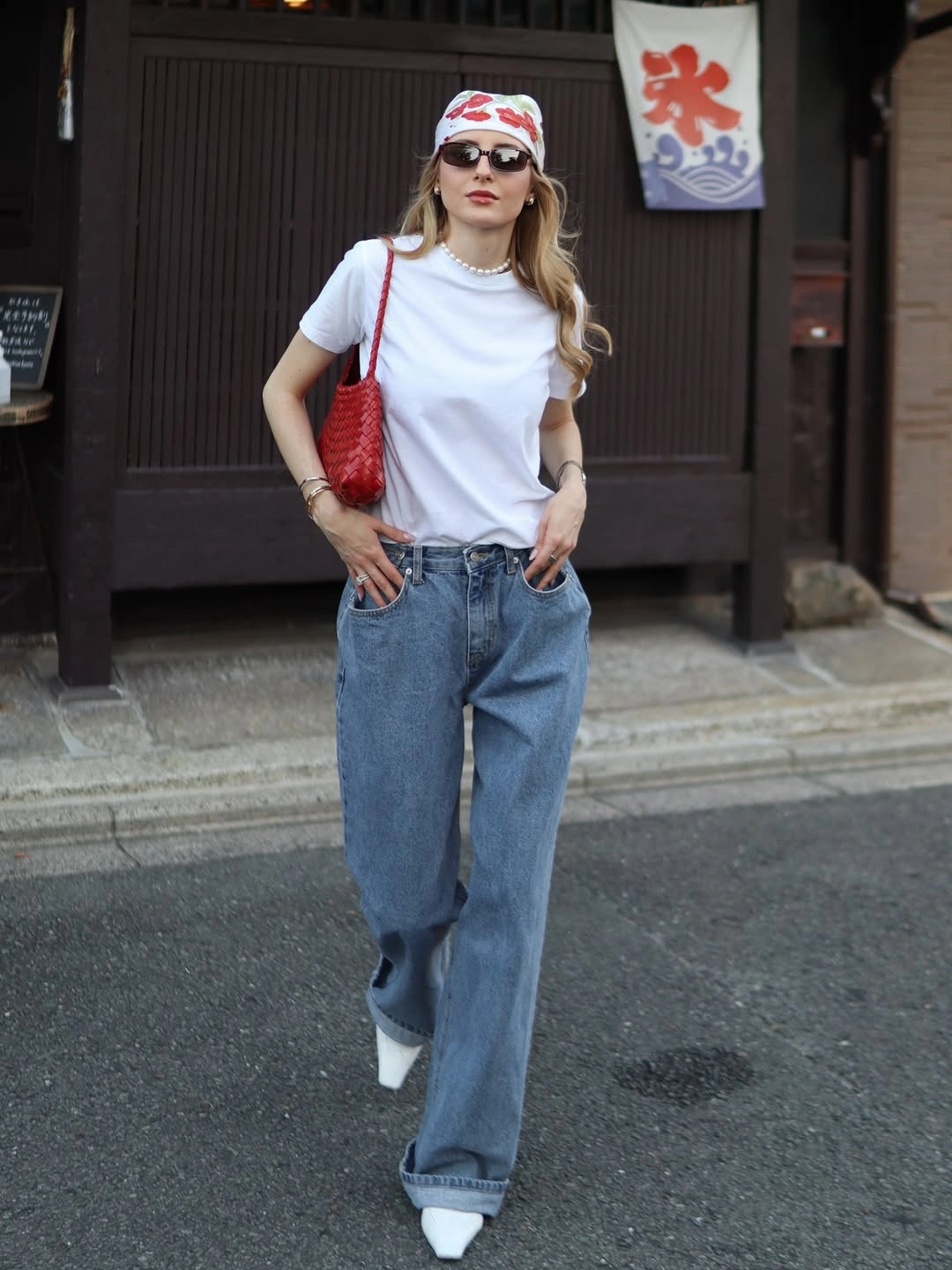 wide leg jeans outfit fall 2026 + White Tee, Red Bag, and Relaxed Denim for an Evening Out