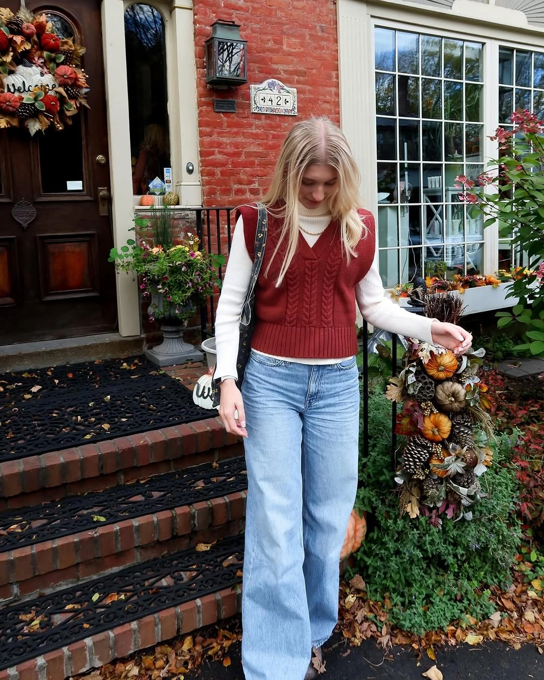 wide leg jeans outfit fall 2026 + Rust Sweater Vest with Soft Light-Wash Denim