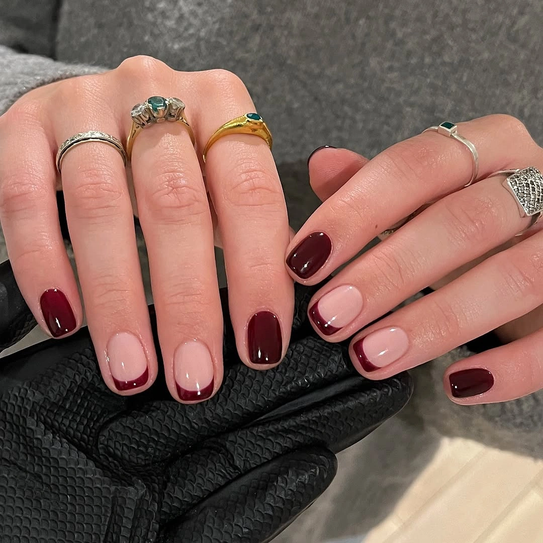Short square nails with burgundy tips and nude space