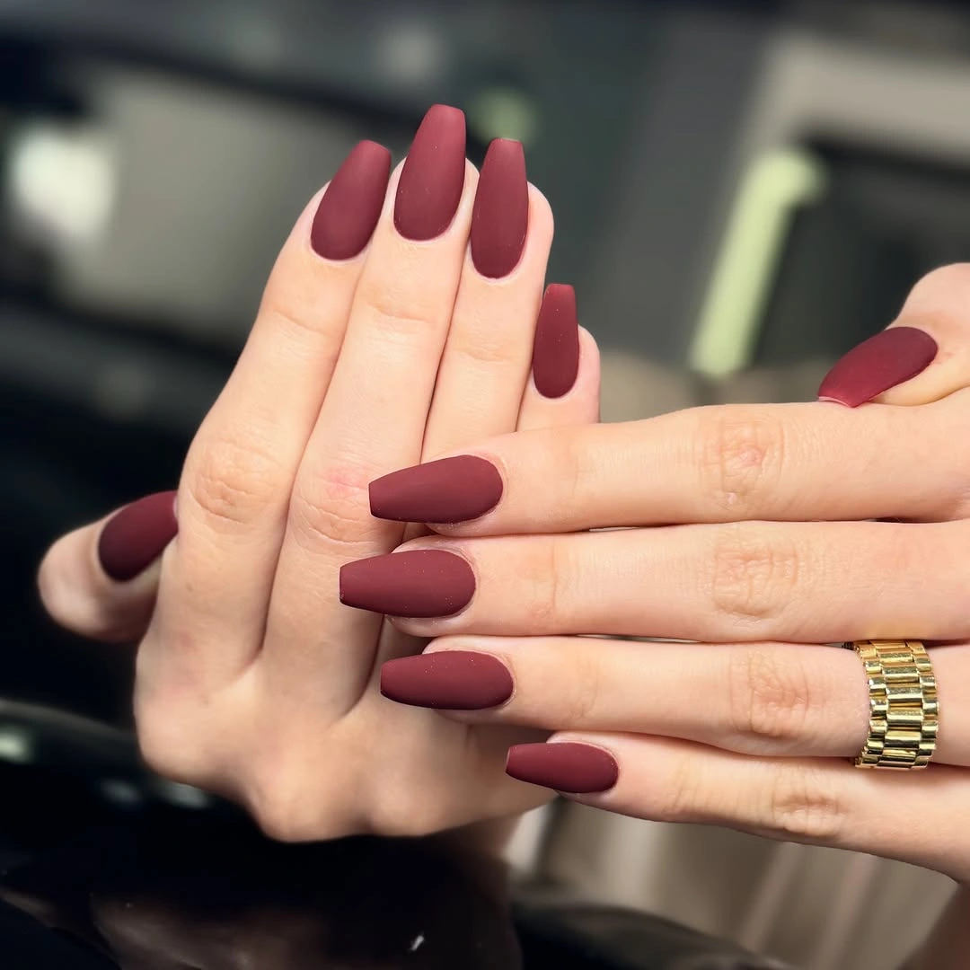 Long square nails in a uniform deep burgundy matte shade