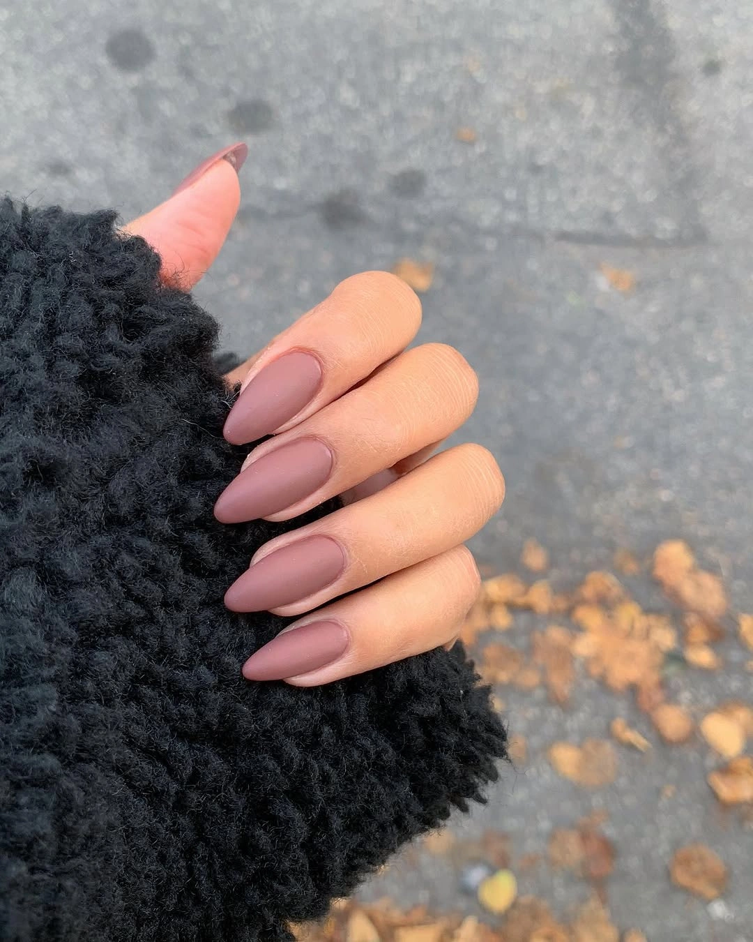 Long almond nails in a dusty mauve matte shade