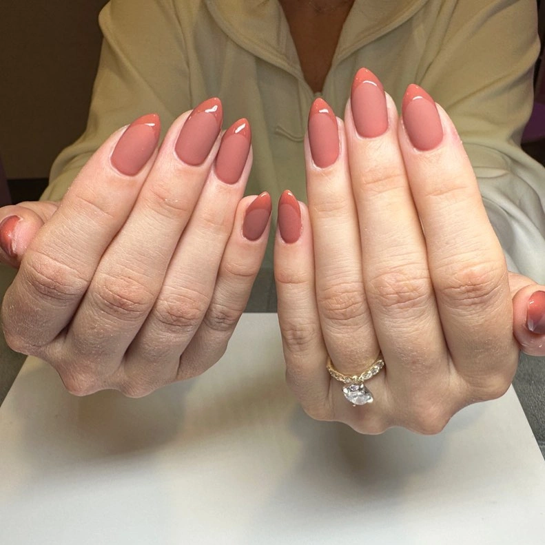 short rounded glossy dusty-pink nails