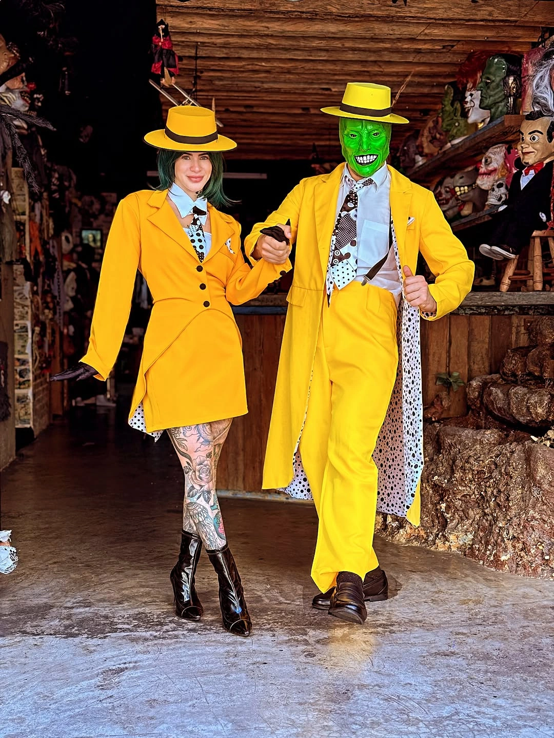 vivid yellow outfit with short tailored skirt suit beside longer trouser suit
