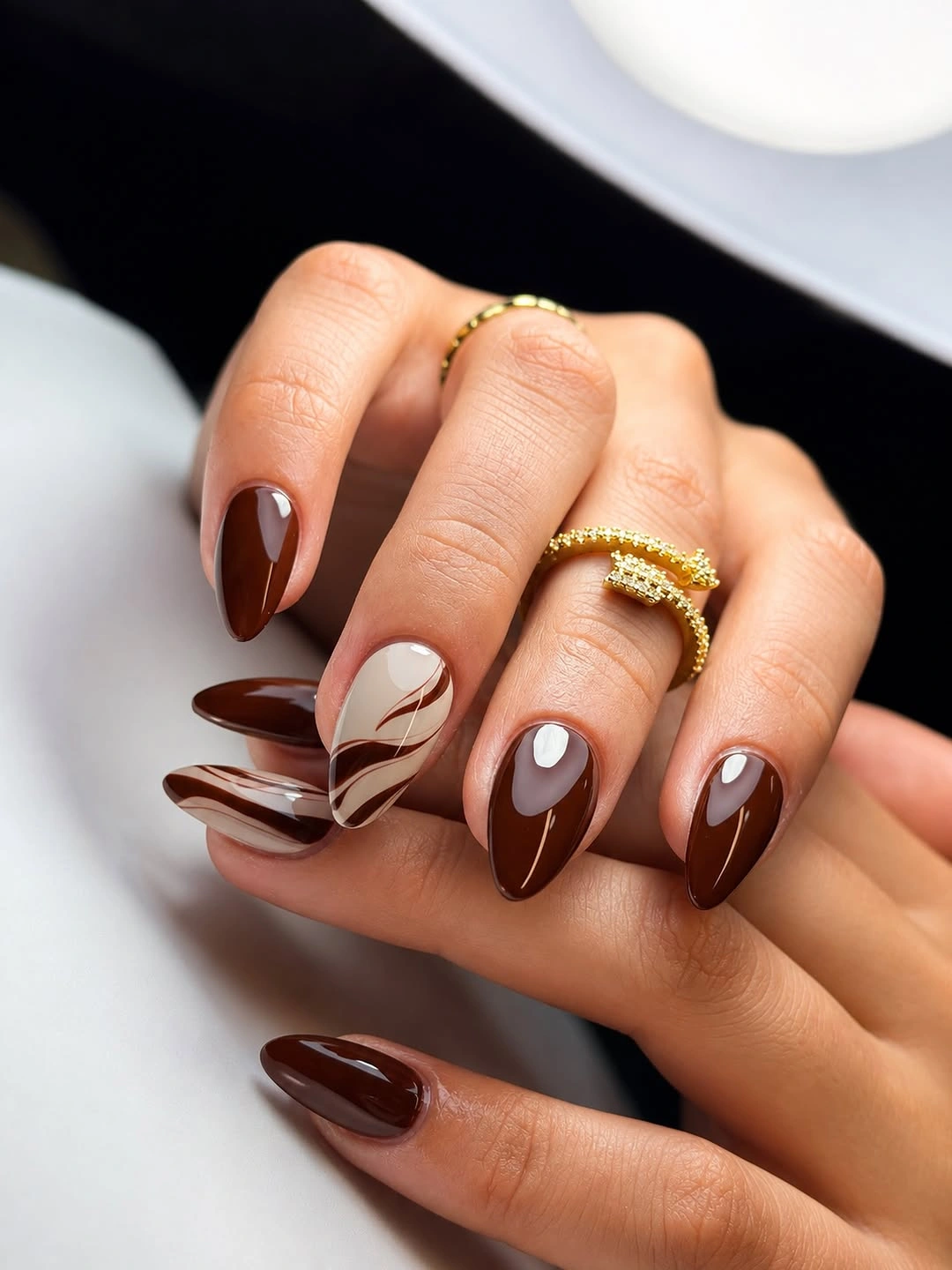 long almond nails with chocolate curved French edges