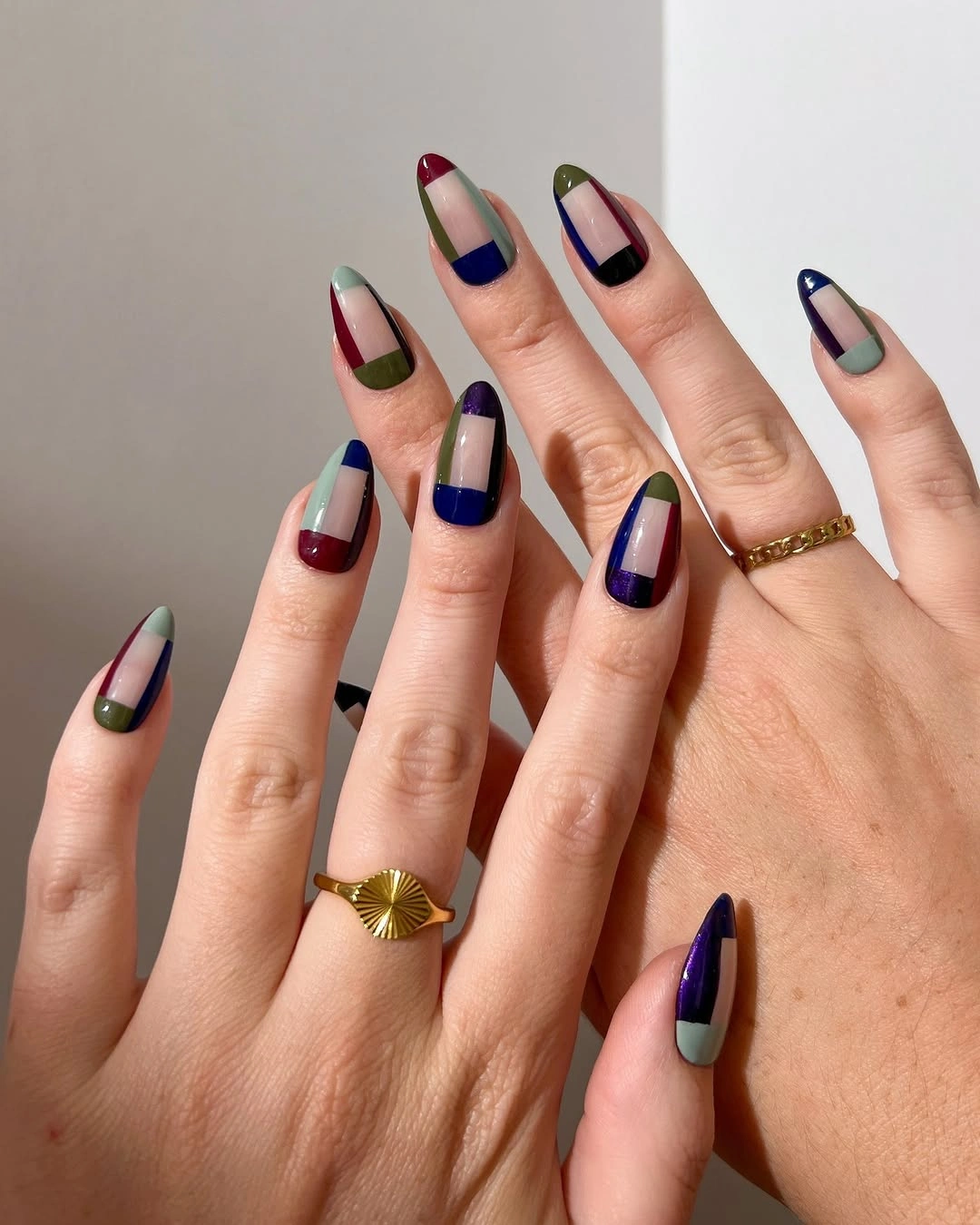 long almond nails with jewel tone tip blocks