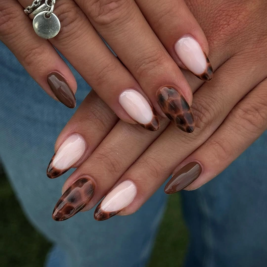 medium almond blush brown nails with tortoiseshell accents
