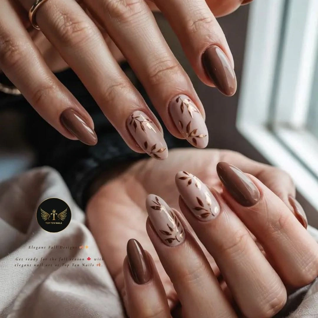 Chocolate brown nails with pale botanical leaf accents