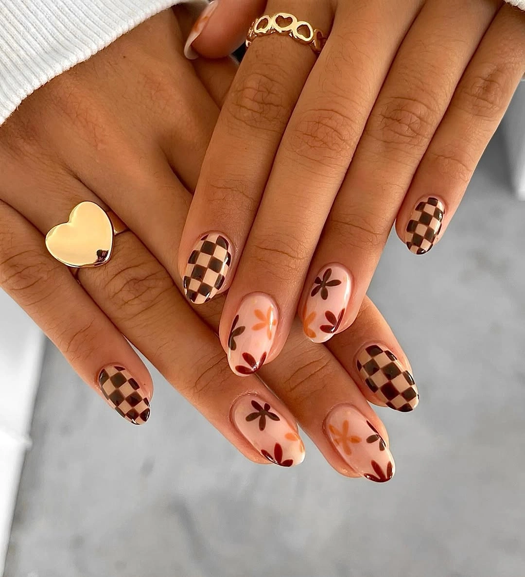 Brown checkerboard and floral almond nails