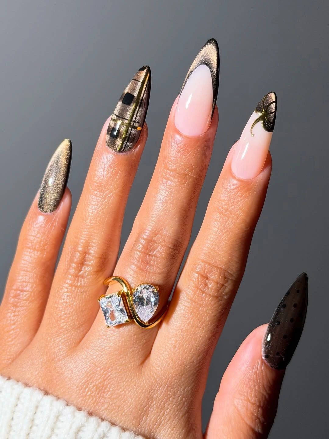 Plaid French almond nails with black curves