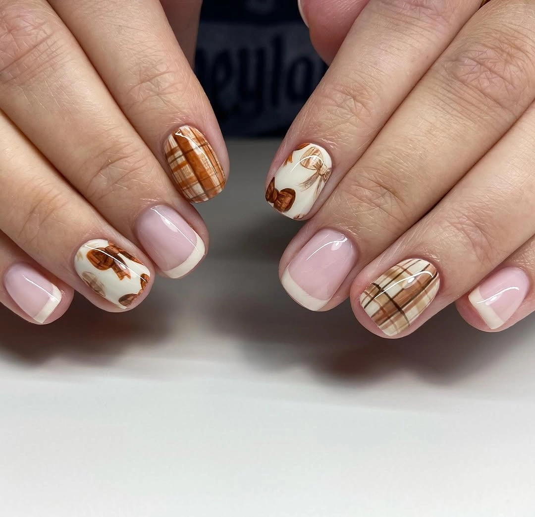 Blush nails with plaid and brown spots
