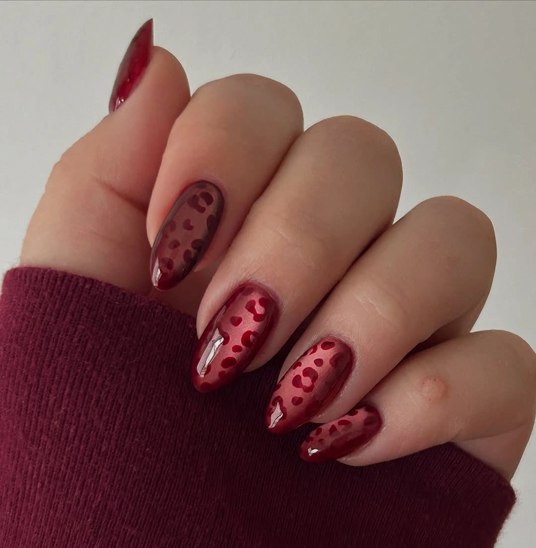 Burgundy jelly nails with red spots