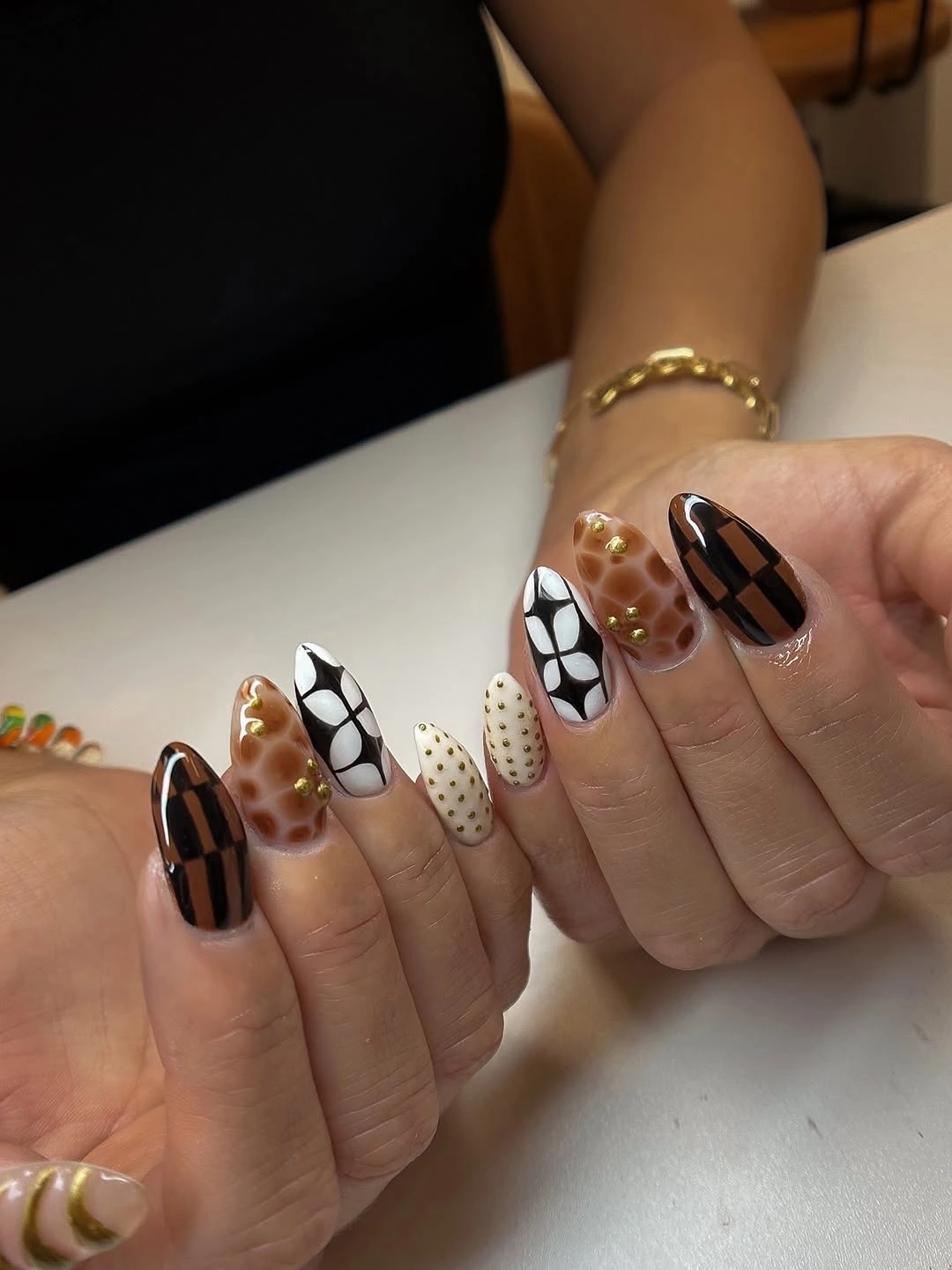 Mixed plaid dot and checkerboard nails