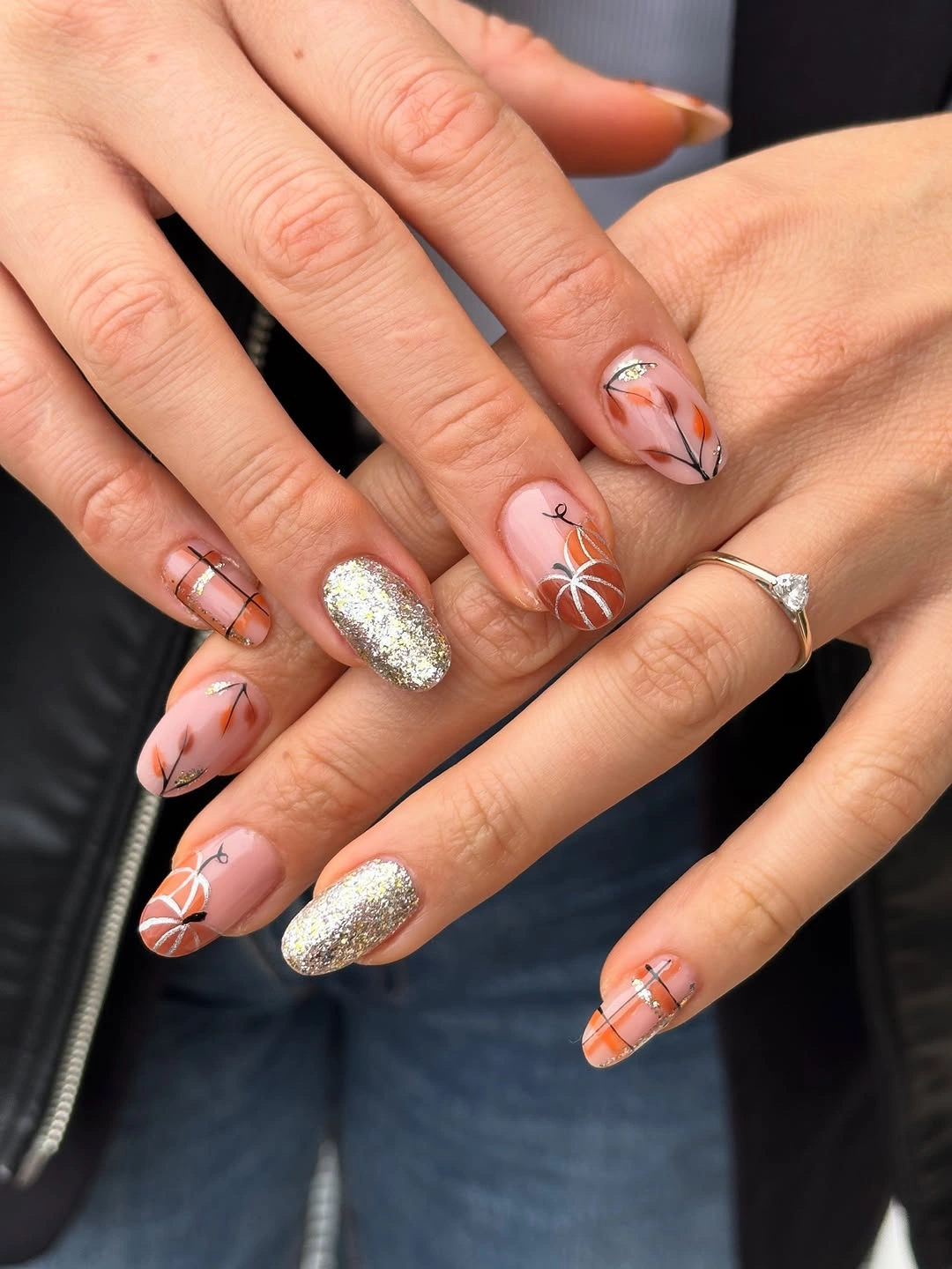 Pink floral plaid and glitter fall nails