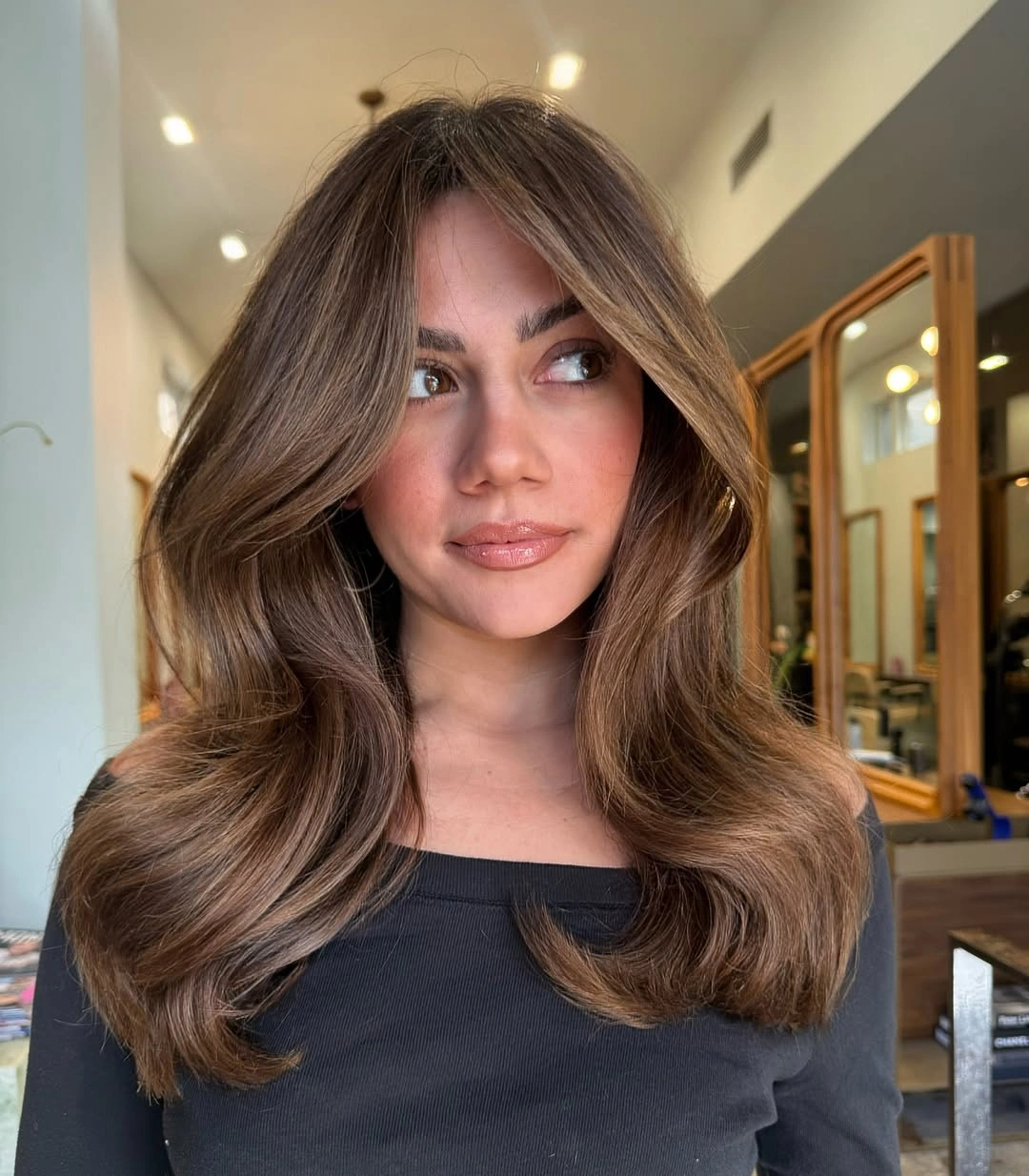 soft brown layered hair with gentle movement