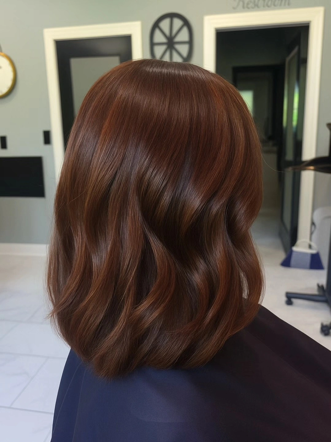 rounded chestnut brown bob with glossy finish