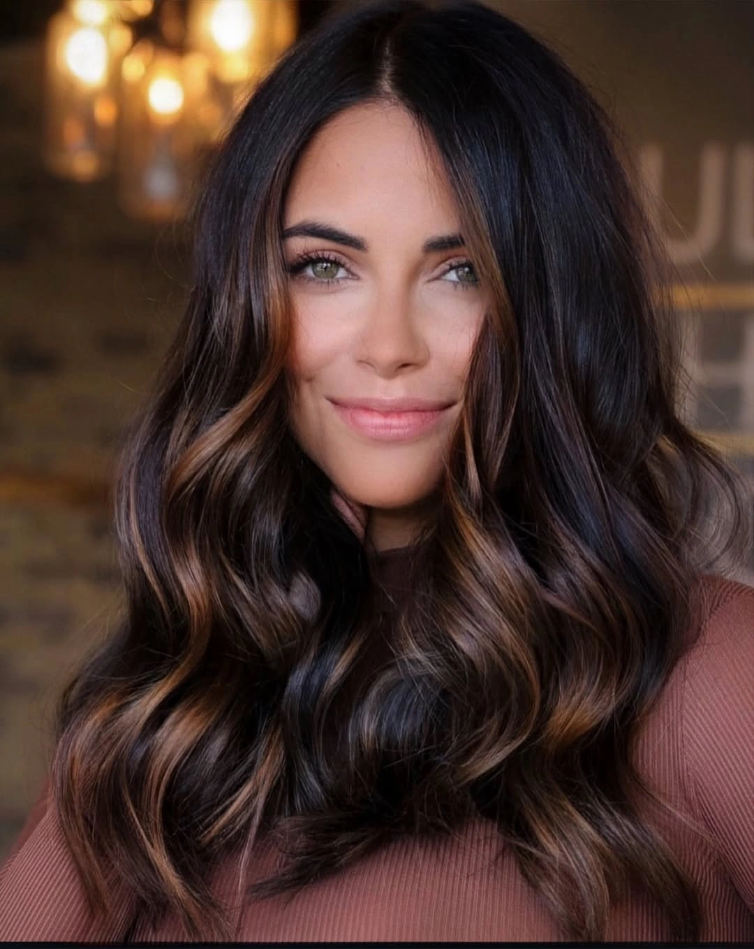 deep brunette waves with subtle warm brown dimension
