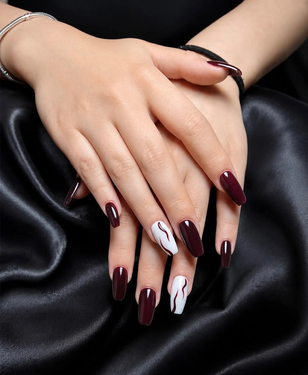 short pale pink square nails with tiny dark accents