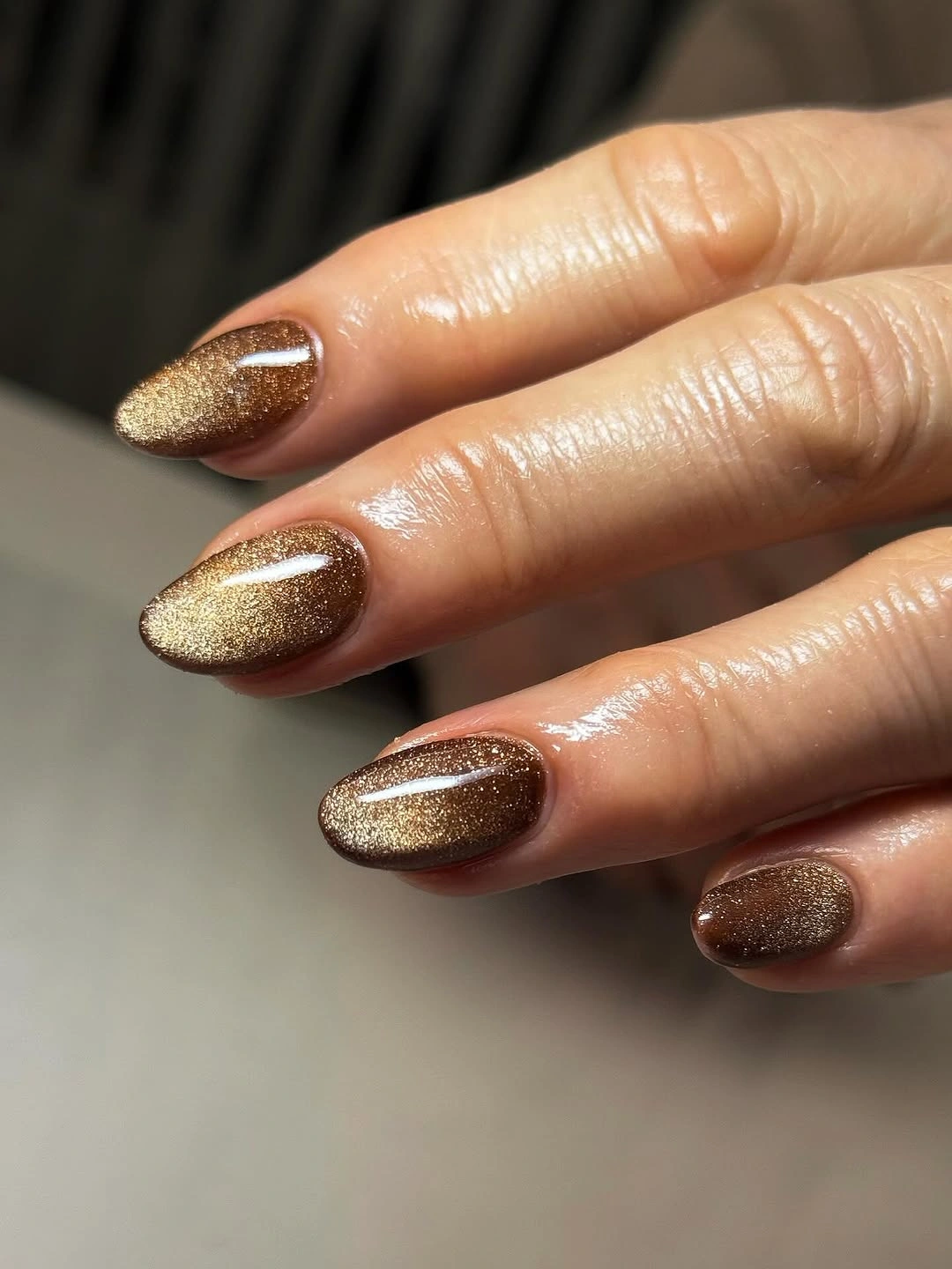 Fall nail idea: medium almond bronze-gold shimmer manicure