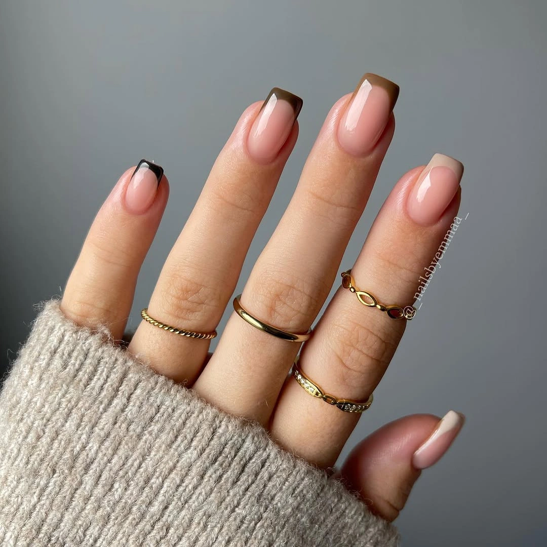 pink nails with black and white French ends