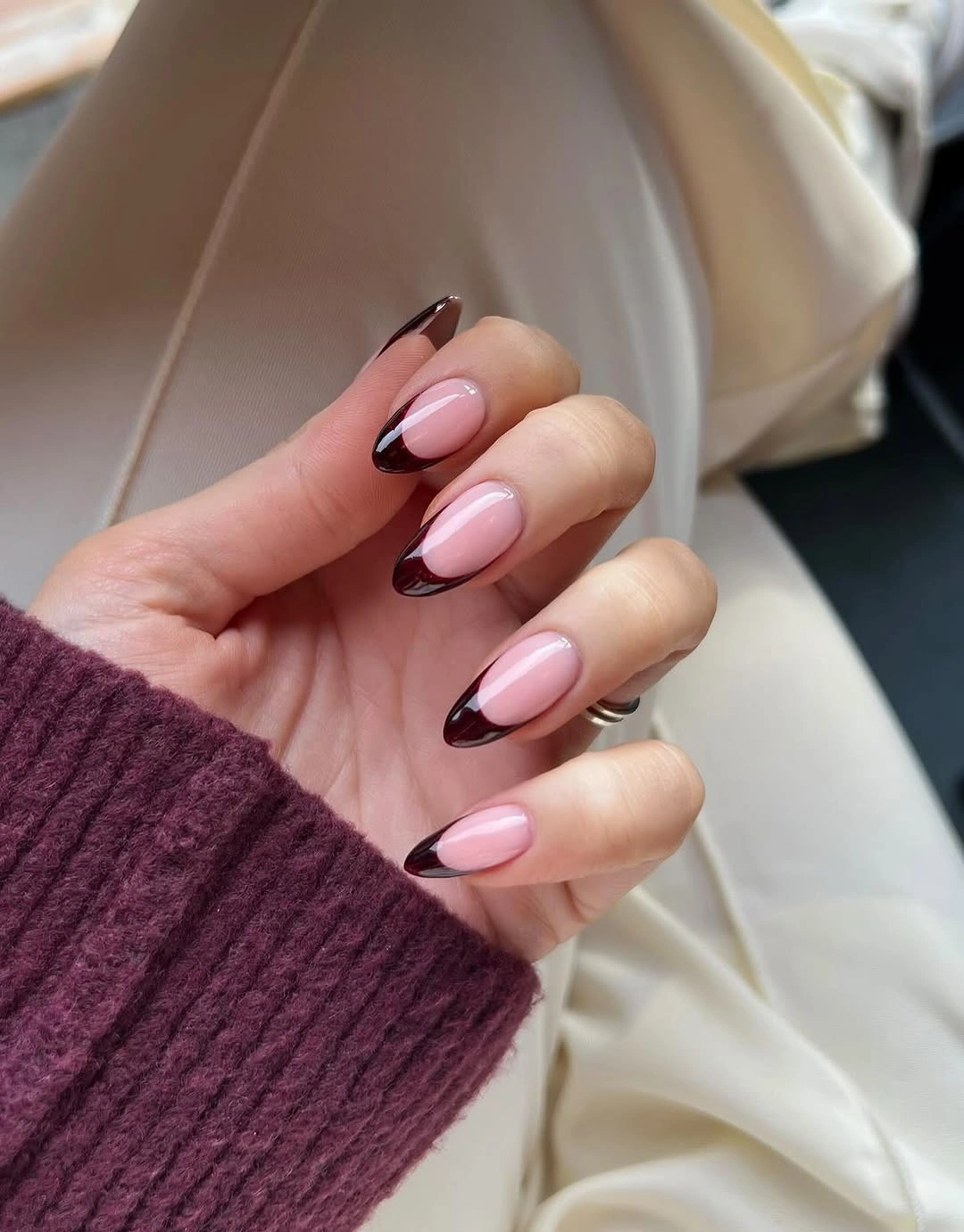 soft pink nails with burgundy V French tips