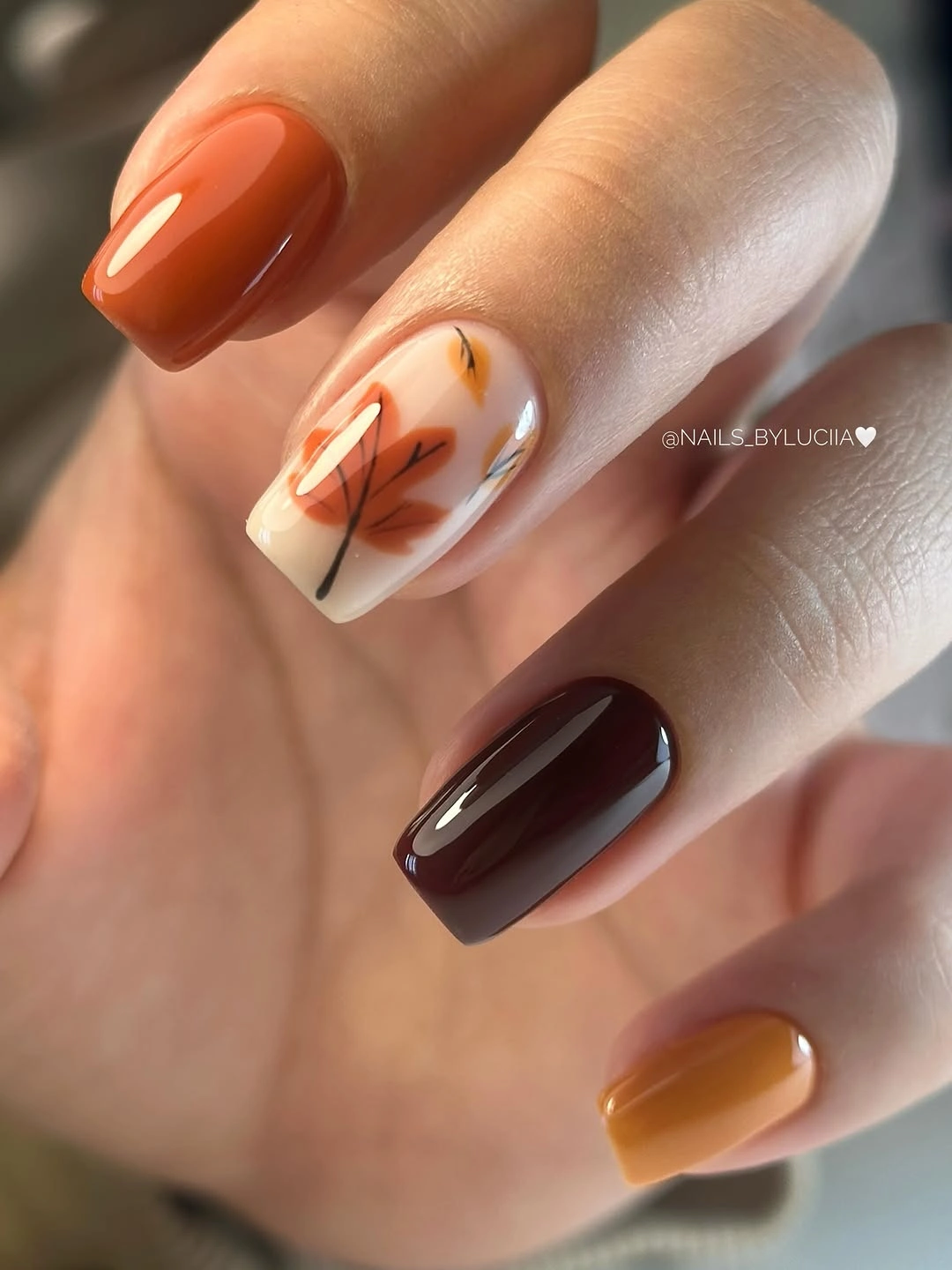 Medium almond deep green nails with pale accents